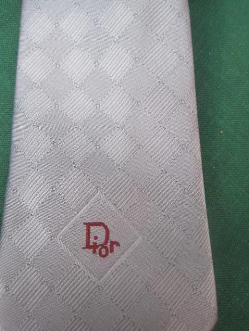  tie grey silk has labels never worn lovely color will match anything 