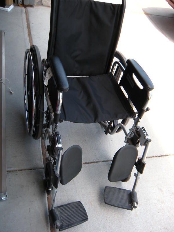 Used Wheelchair, tire lock 17wx18dx18h w/foot rests  