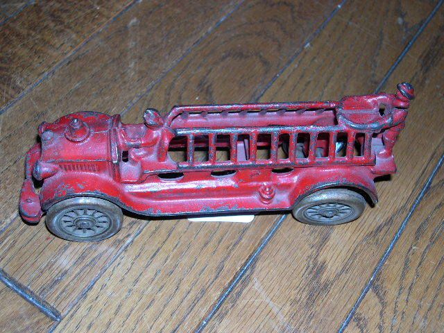 Circa 1936 Cast Iron Hook & Ladder Fire Truck Toy  